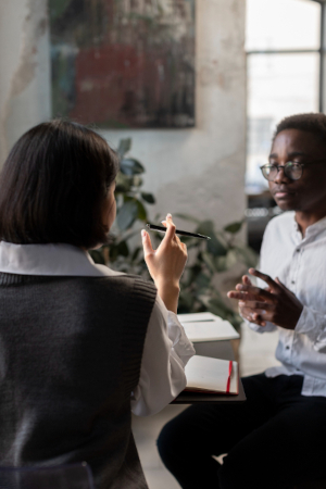 pair of people in a meeting