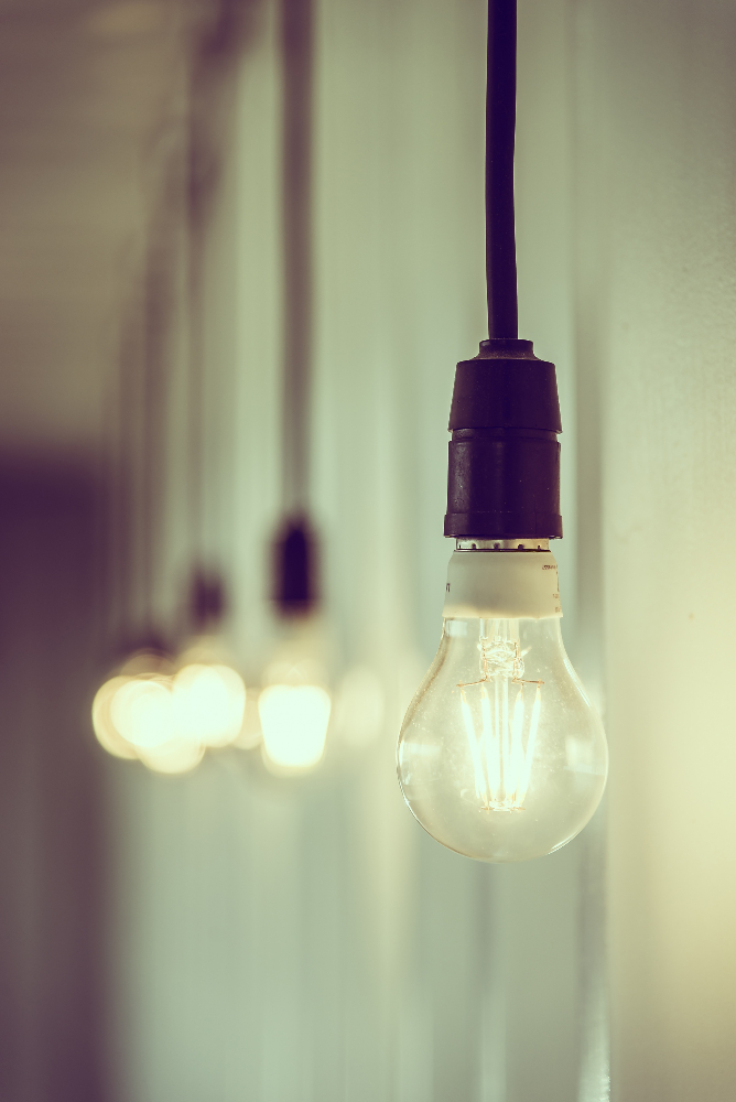 row of hanging light bulbs row of hanging light bulbs